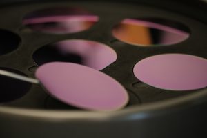 Wafers being loaded in one of CPFC’s batch-operated wafer processing tools.
