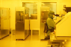 A CPFC team member performing wafer inspection.