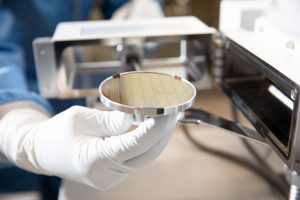 A semiconductor wafer of photonic components fabricated at ATF.