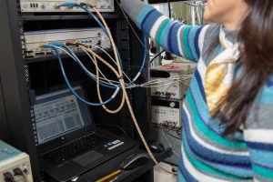 System-level testing of a photonic device.