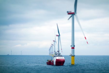 Big Offshore wind-farm with transfer vessel Wind-turbine, offshore, worker, boat, sea, sun, vessel