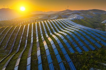 Aerial View Of Solar Panels In Mountain