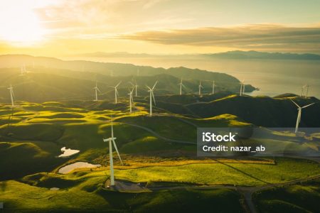 istockphoto-1489946881-1024×1024 Grand view of Windmills along the coast at sunset time in Wellington, New Zealand.